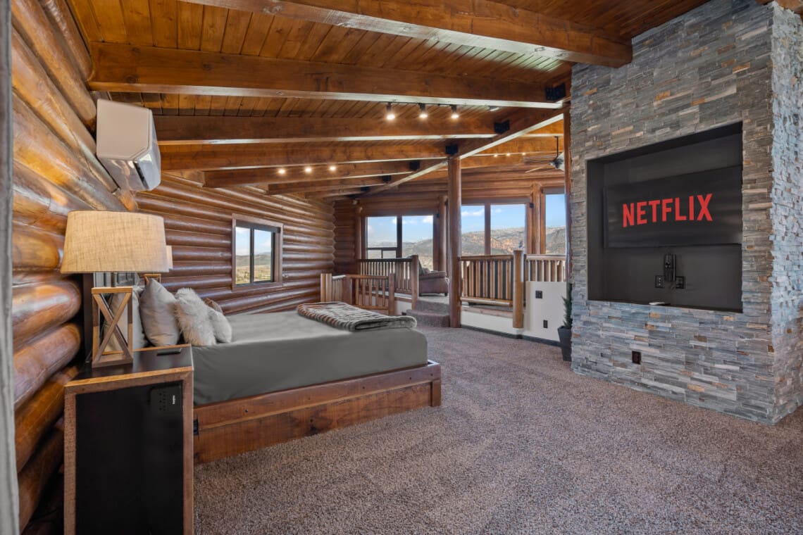 Master bedroom with 55" Roku TV